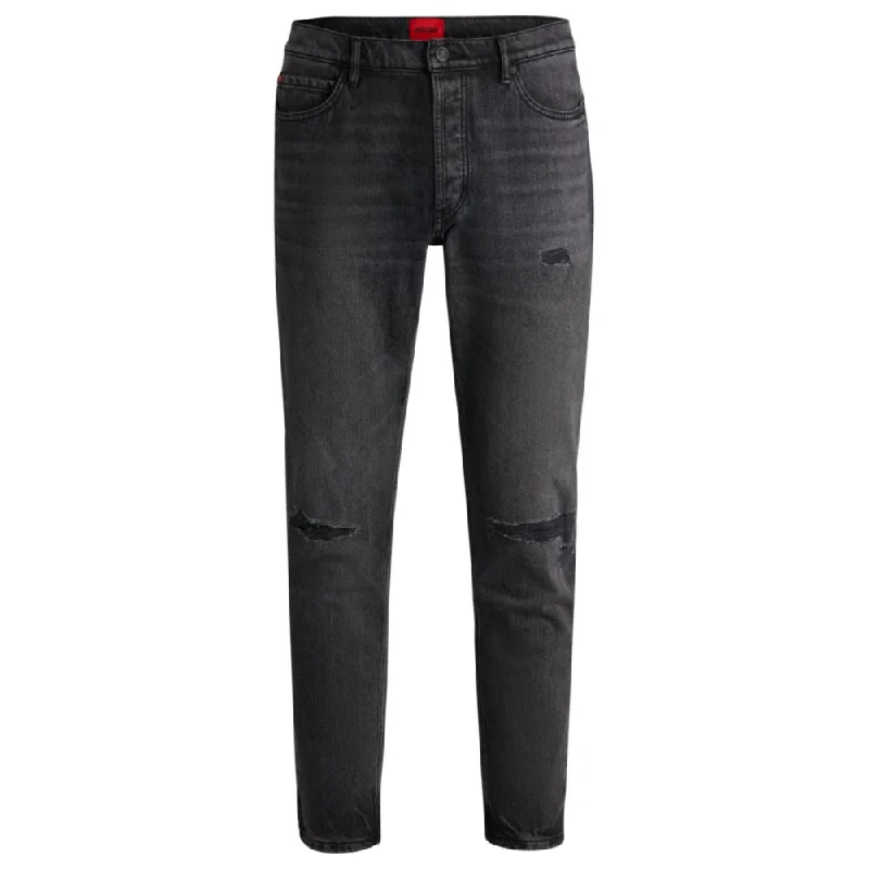 Tapered-fit jeans in black distressed denim